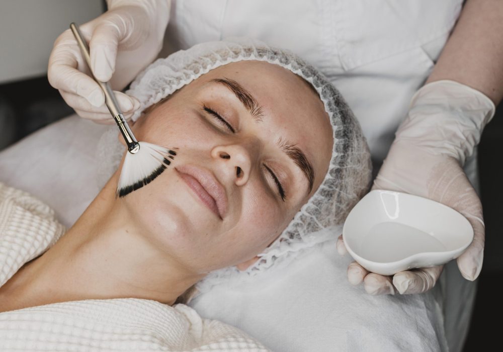 young-woman-getting-face-skin-treatment young-woman-getting-face-skin-treatment